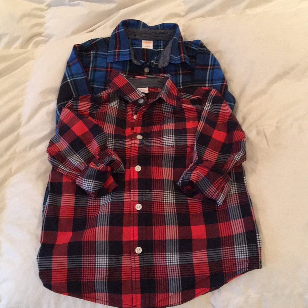2 Gymboree boy button down shirts.   Worn 1 time.